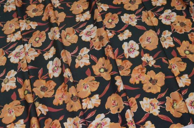 Vendita on line tessuto interlock fantasia fiore arancio fondo nero - tessuti abbigliamento viscosa