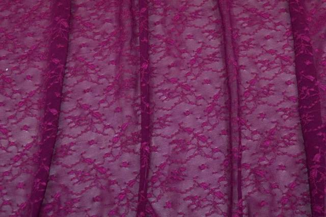 Vendita on line tessuto tulle operato fucsia scuro con fiori ricamati - tessuti abbigliamento poliestere fantasia