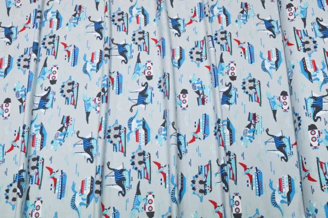 Vendita on line tessuto maglina in cotone fantasia dinosauri - tessuti abbigliamento magline / jersey/tessuto in fantasia