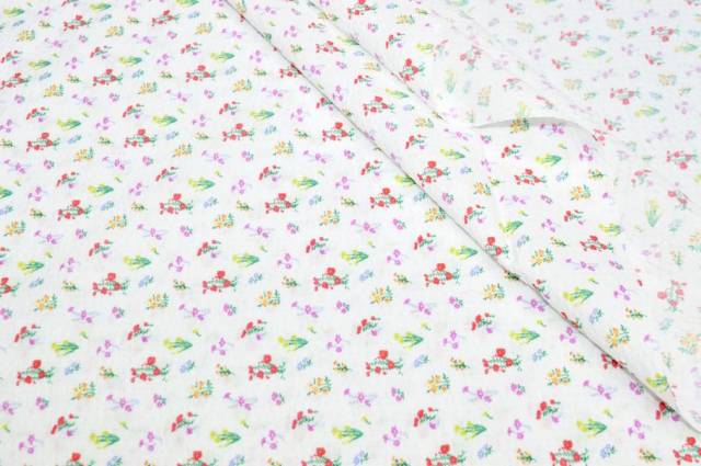 Vendita on line tessuto mussola puro cotone goffrato fiorellino multicolor - prodotti