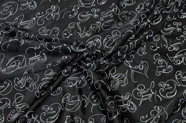 Vendita on line tessuto devoreh nero fantasia lettere - tessuti abbigliamento