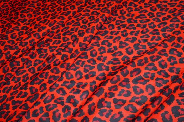 Vendita on line tessuto pura viscosa maculato arancio logo msgm - occasioni e scampoli tessuti fantasie 