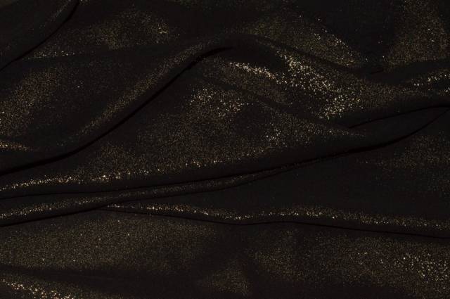 Vendita on line tessuto chiffon glitterato nero/oro - ispirazioni carnevale
